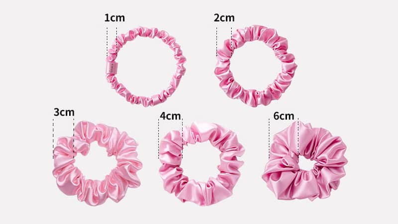 Custom silk scrunchies in various styles and colors with private label packaging for hair and beauty brands