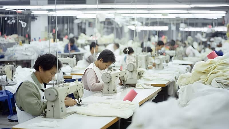Inside view of a China silk clothing manufacturer factory producing custom silk pajamas, robes, and sleepwear garments