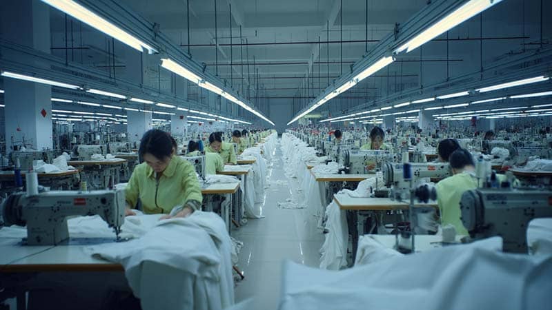 Modern Chinese silk clothing manufacturer with experienced workers and advanced sewing equipment